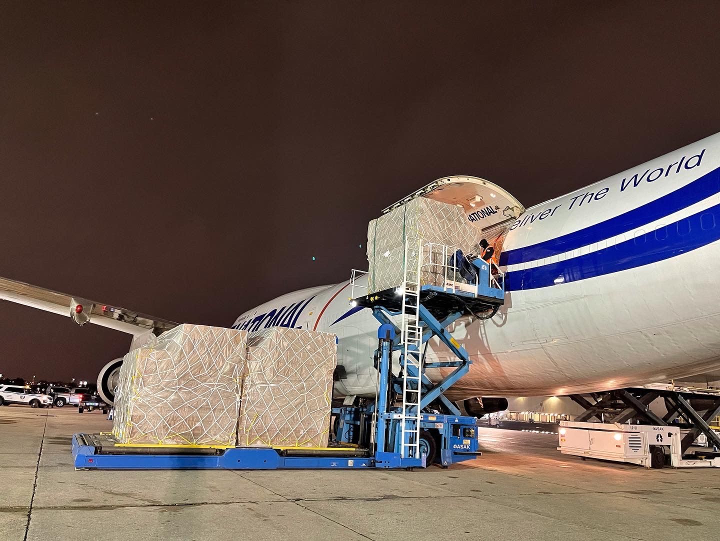 cargo being loaded into a national plane